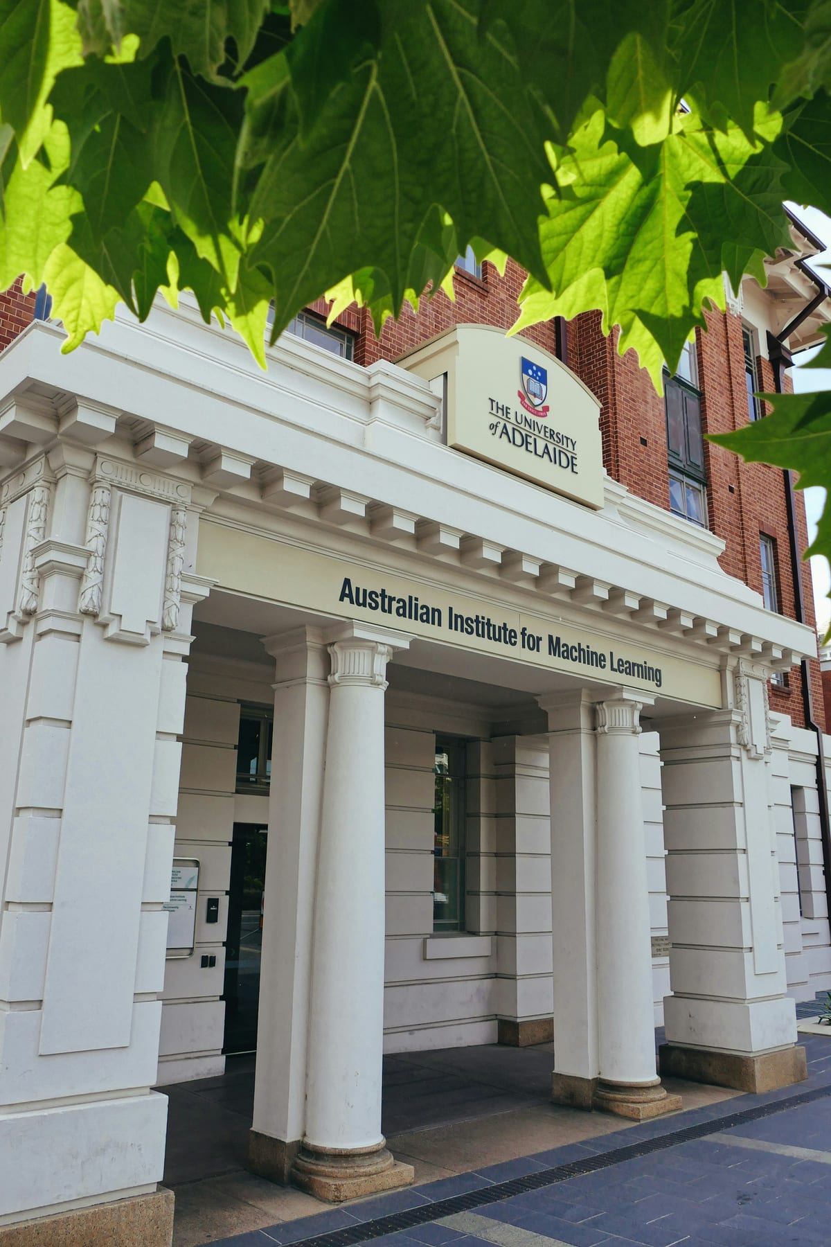 A white columned institutional building exterior